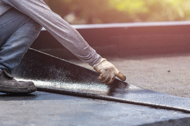 Professional Basement Waterproofing technician working in Glenwood, MN